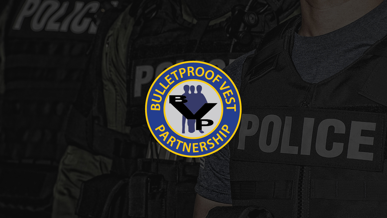 Image of Police in background with Bulletproof Vest Partnership Program BVP logo in center